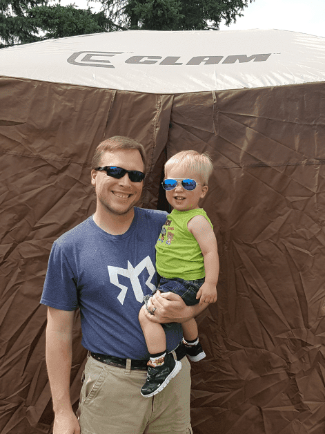 Clam quickset pavilion with a happy family